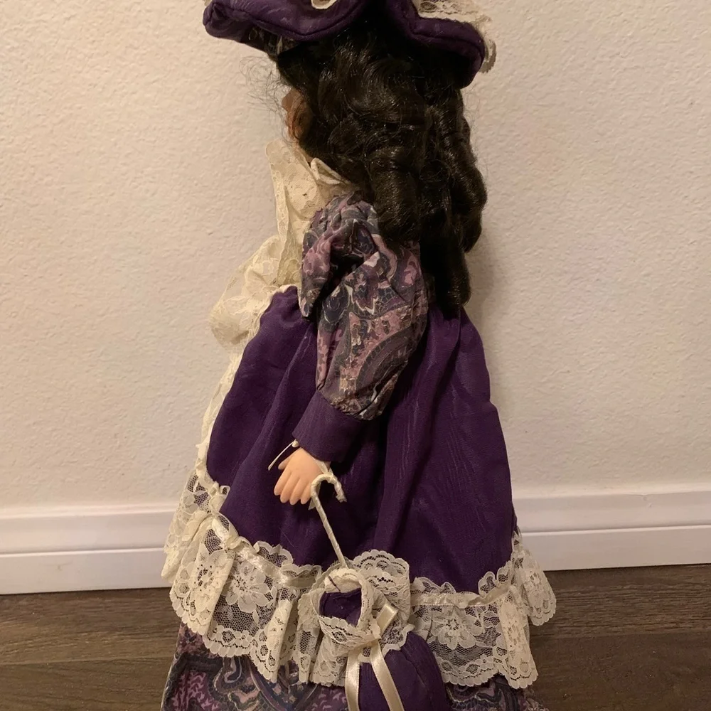 Elegant Purple and Cream Doll